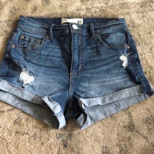 Garage: Barely worn, ripped jean shorts.